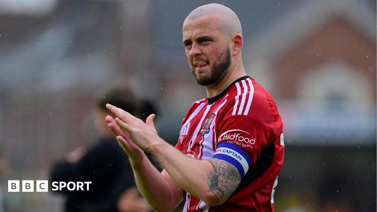 Cheltenham Town sign defenders Sweeney and Tomlinson
