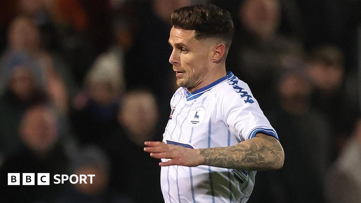 Boston sign midfielder Holohan